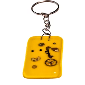 Porte clés en verre jaune - mécano