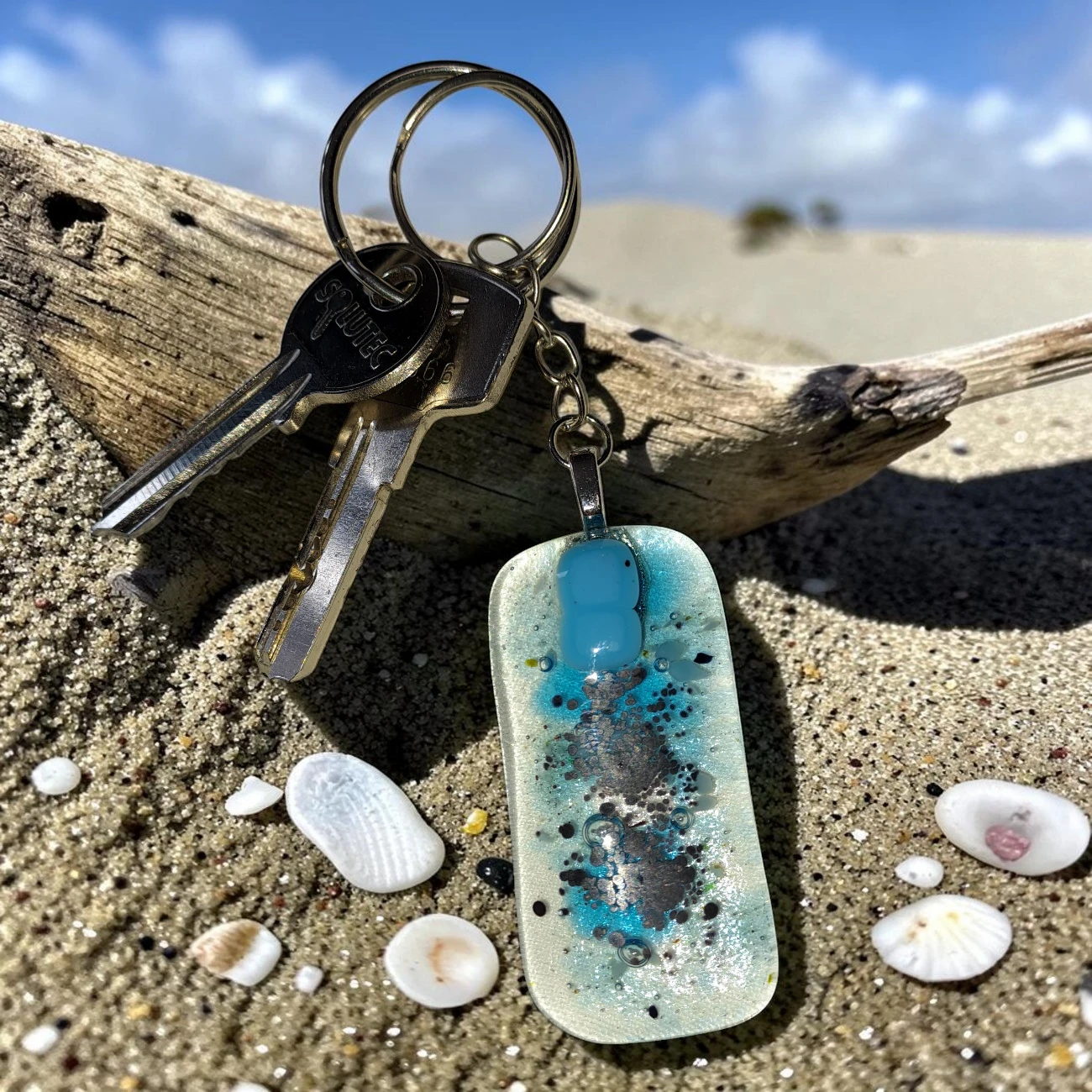 Porte clés original en verre plage